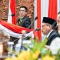 Juru bicara Komisi C DPRD Jatim, Nur Faizin, saat membacakan laporan terkait Raperda PT BPR Jatim dalam sidang paripurna. Senin (23/12/2024).