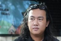 Foto: Sosok Andrie Yunus, aktivis KontraS yang tak lelah menyuarakan HAM meski menjadi korban kekerasan. Koalisi Masyarakat Sipil kini berjuang memastikan kasus penyiraman air keras terhadapnya mendapatkan keadilan sejati melalui proses peradilan yang transparan